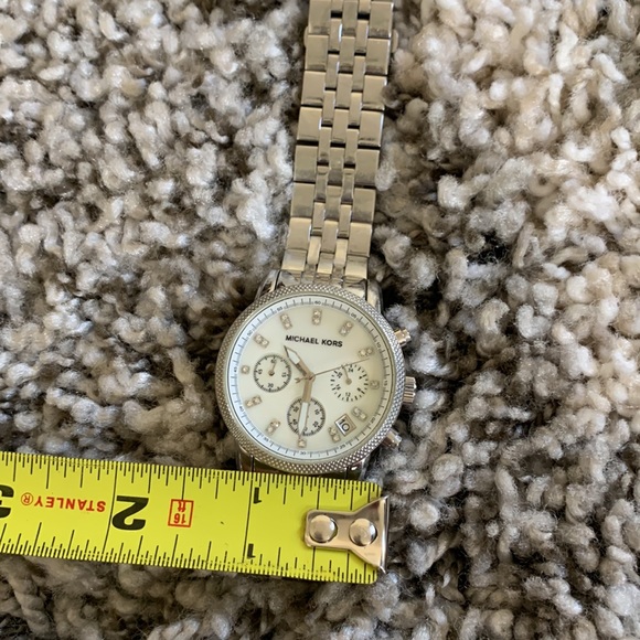 Michael Kors silver watch with pearl face, scratches as shown main image 4